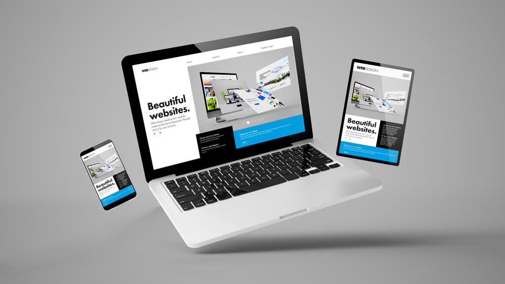Flying Tablet, Laptop and Mobile Phone Showing Builder Website